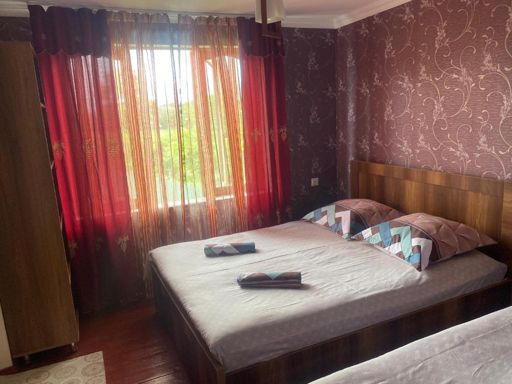 Postel nebo postele na pokoji v ubytování Guesthouse Dadia
