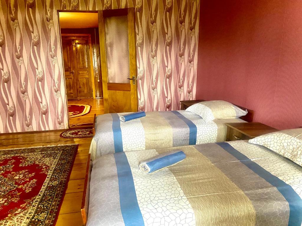 Postel nebo postele na pokoji v ubytování Guesthouse Dadia