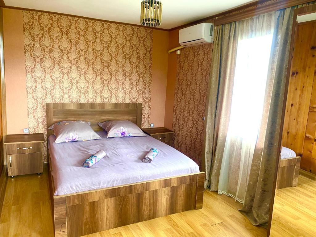 Postel nebo postele na pokoji v ubytování Guesthouse Dadia