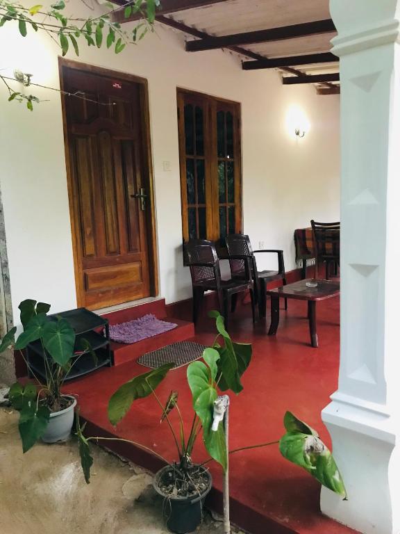 Posezení v ubytování Sigiri Mihira Home Stay