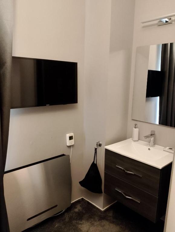 TV a/nebo společenská místnost v ubytování Váralja Home