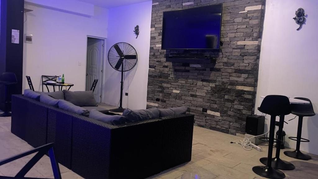 TV a/nebo společenská místnost v ubytování LEVEL suites #7