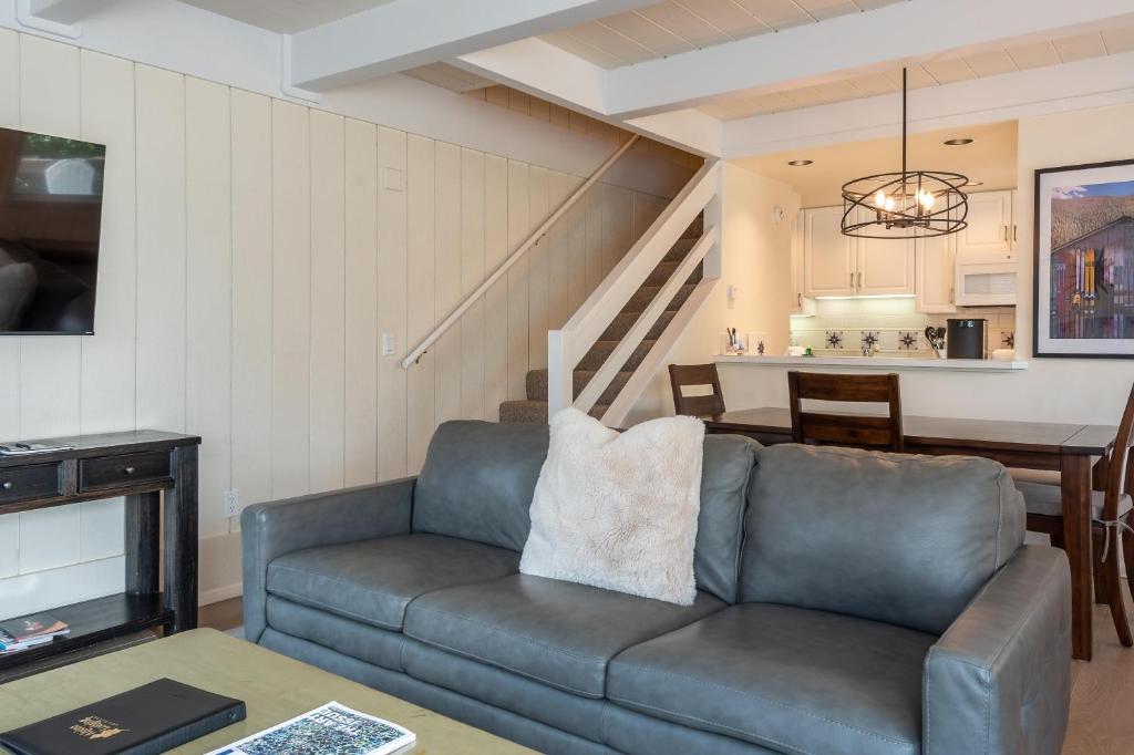 a living room with a couch and a table at Villager Condo 1207 in Sun Valley