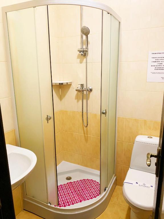 Koupelna v ubytování Breeze Hotel