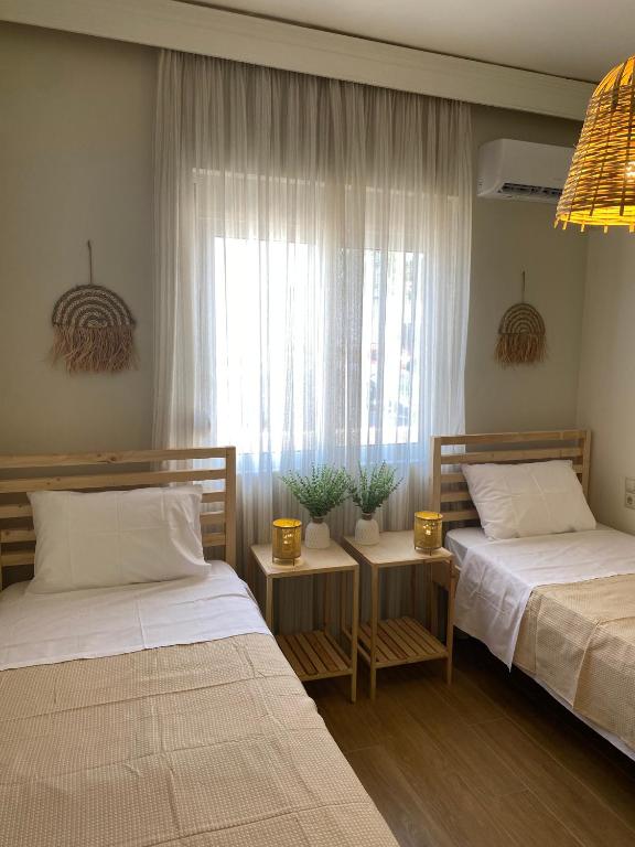 Postel nebo postele na pokoji v ubytování Bohemian Paradise Villa