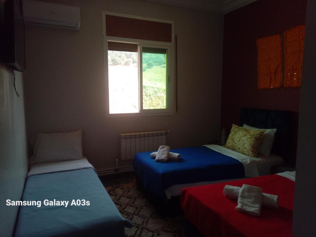 Postel nebo postele na pokoji v ubytování Gîte Forest Tagroumte
