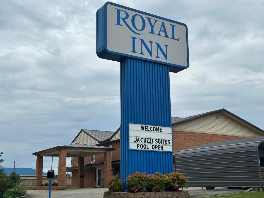 a royal inn sign in front of a building at Royal Inn - Anniston in Anniston
