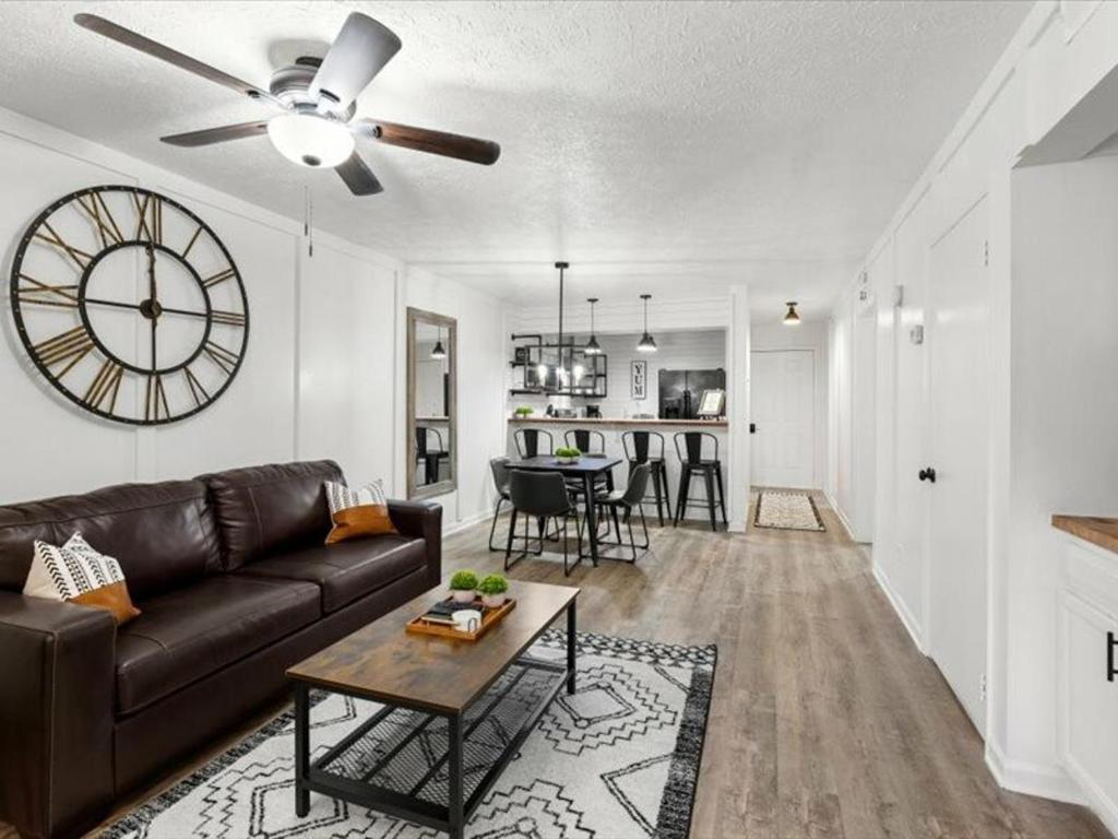 a living room with a couch and a table at Turkey Nest By Beyond Expectations Renovated 2br in Gatlinburg