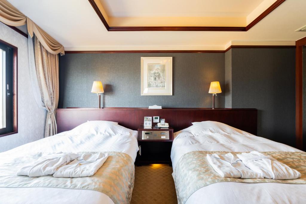 Postel nebo postele na pokoji v ubytování Hotel Sanderson