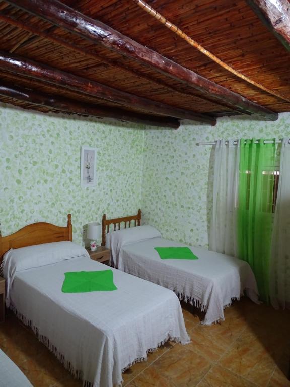Ένα ή περισσότερα κρεβάτια σε δωμάτιο στο casita de abuela