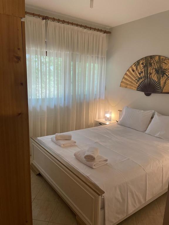 Кровать или кровати в номере Garden View home in Makri