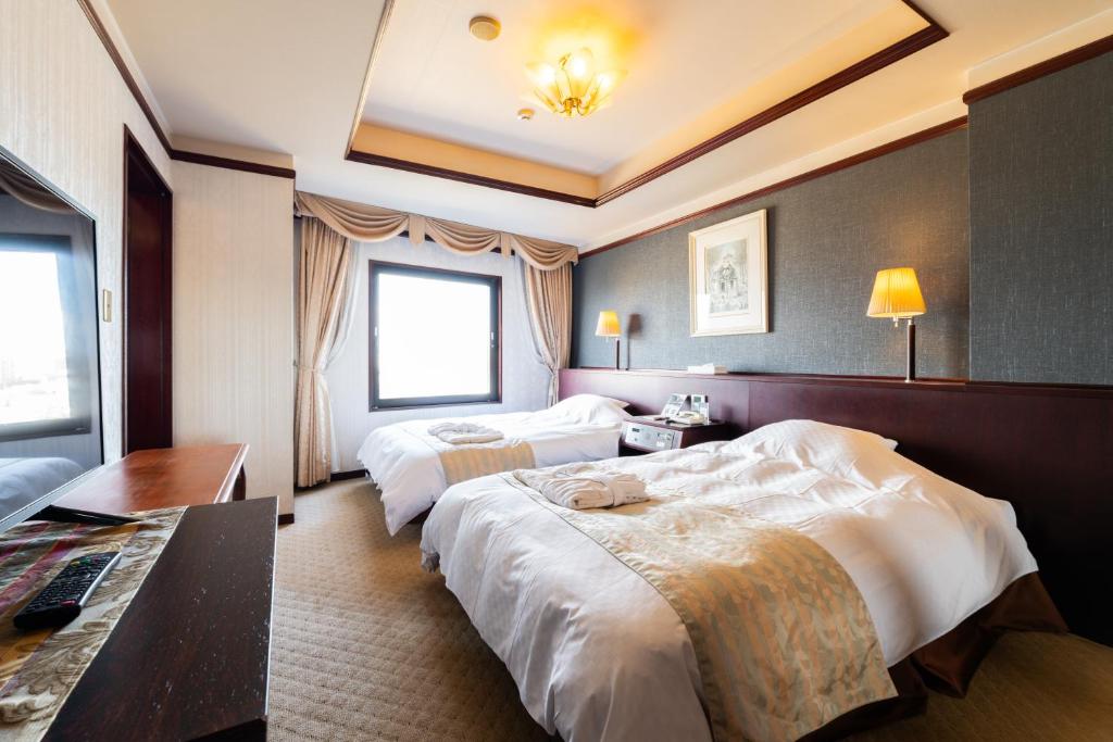 Postel nebo postele na pokoji v ubytování Hotel Sanderson