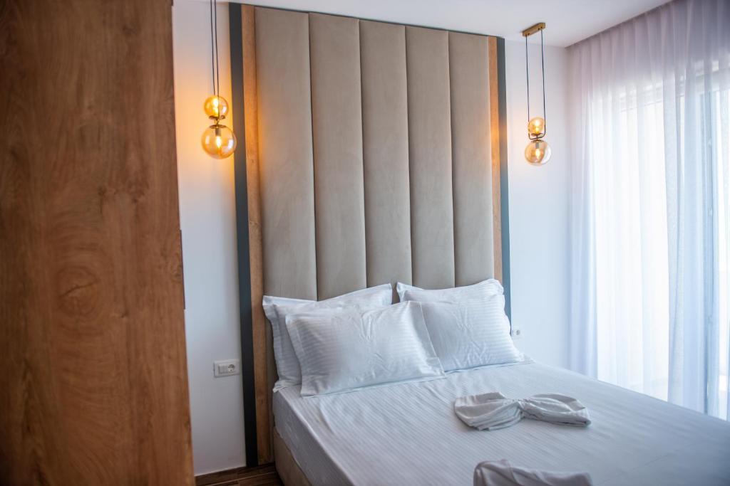 Postel nebo postele na pokoji v ubytování Cataleya Resort