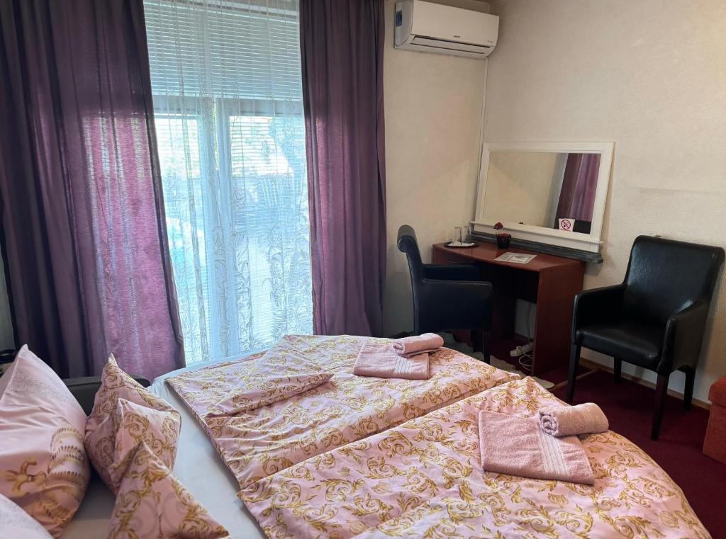 Postel nebo postele na pokoji v ubytování Apartments Stari Točak Sarajevo