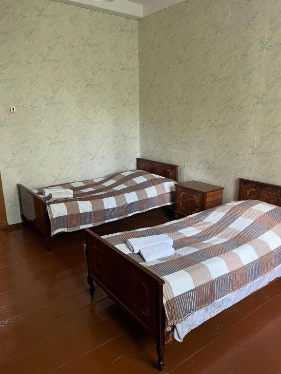 Postel nebo postele na pokoji v ubytování Guesthouse in Lankhvri