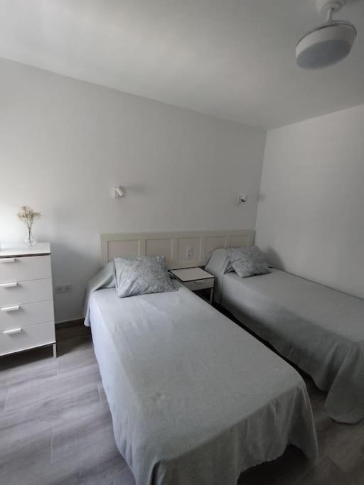 Postel nebo postele na pokoji v ubytování Flamboyán Vista Mar