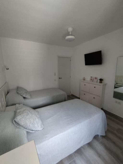 Postel nebo postele na pokoji v ubytování Flamboyán Vista Mar