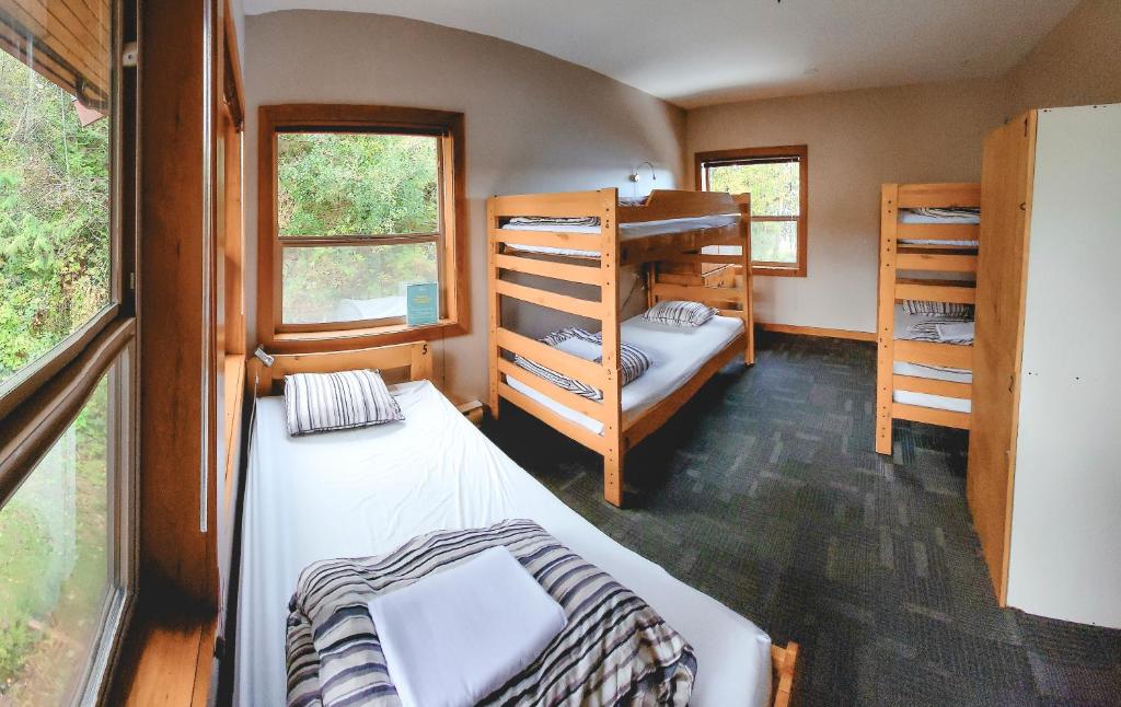Postel nebo postele na pokoji v ubytování Whalers Guesthouse