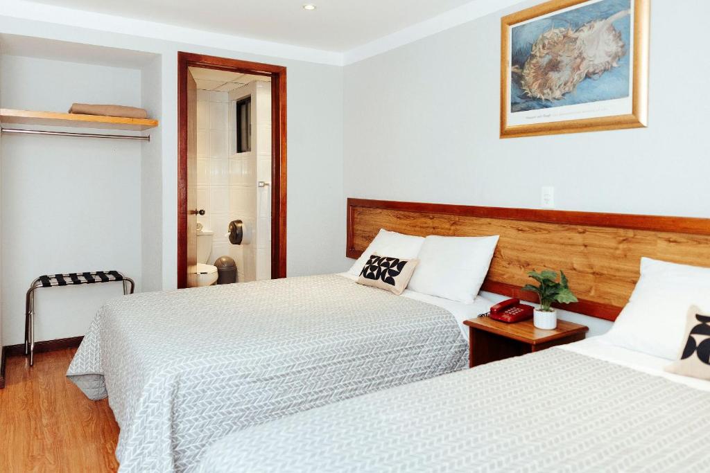 Postel nebo postele na pokoji v ubytování Hotel Don Simón