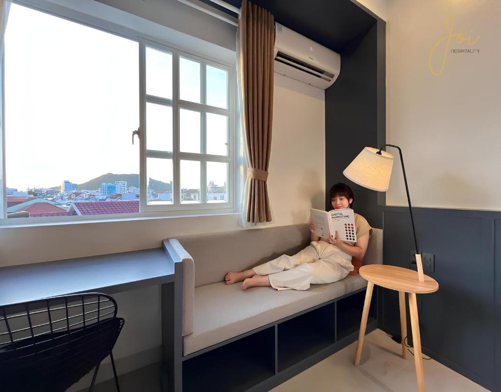 Joi Hospitality - Hoang Anh - 带阳台的套房