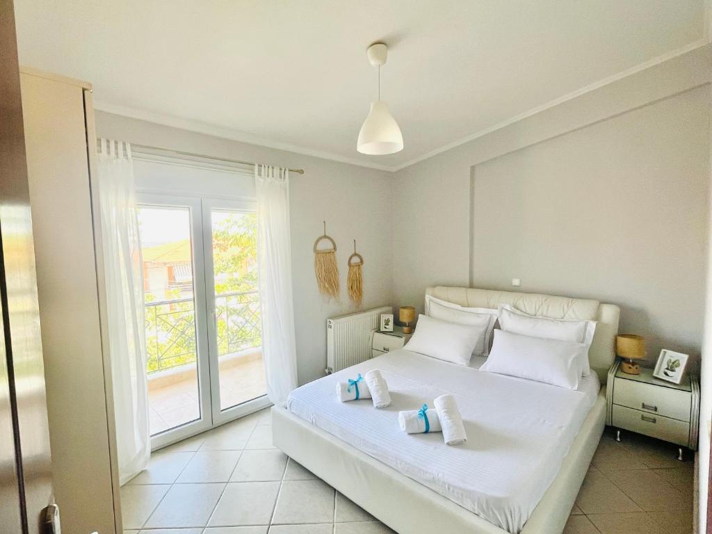 Postel nebo postele na pokoji v ubytování Polyxeni's Summer Escape