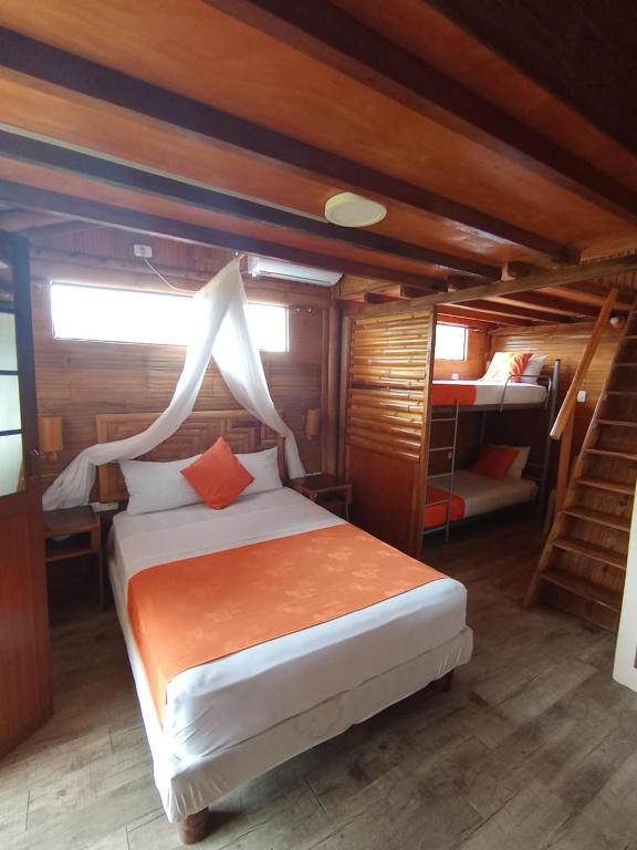 Postel nebo postele na pokoji v ubytování Hosteria B y B