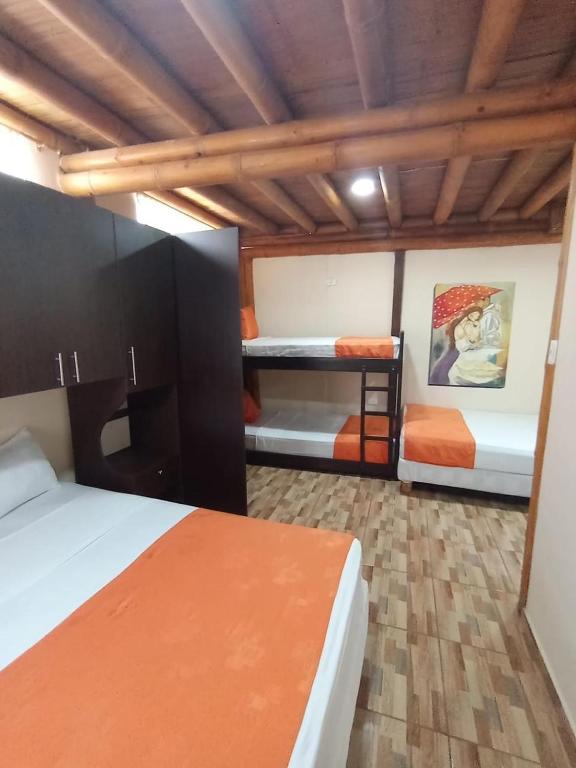 Postel nebo postele na pokoji v ubytování Hosteria B y B