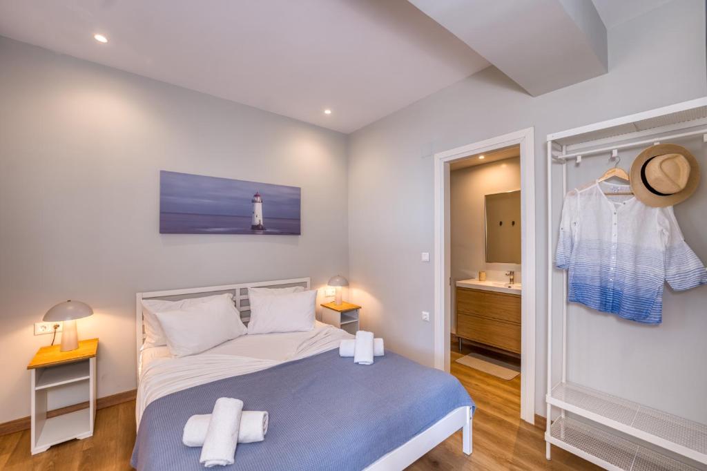 Posteľ alebo postele v izbe v ubytovaní Glyfa Beach Villas