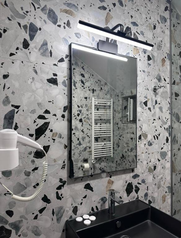 Koupelna v ubytování Hotel Driloni