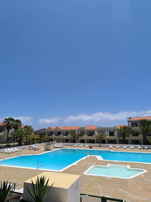 a view of a swimming pool at a resort at Casa Las Torres 209 in Costa de Antigua