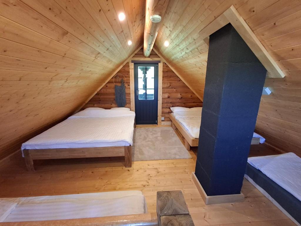Postel nebo postele na pokoji v ubytování Tirtsu puhkemaja