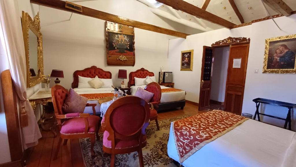 Posteľ alebo postele v izbe v ubytovaní Casona Corrales Hotel Boutique