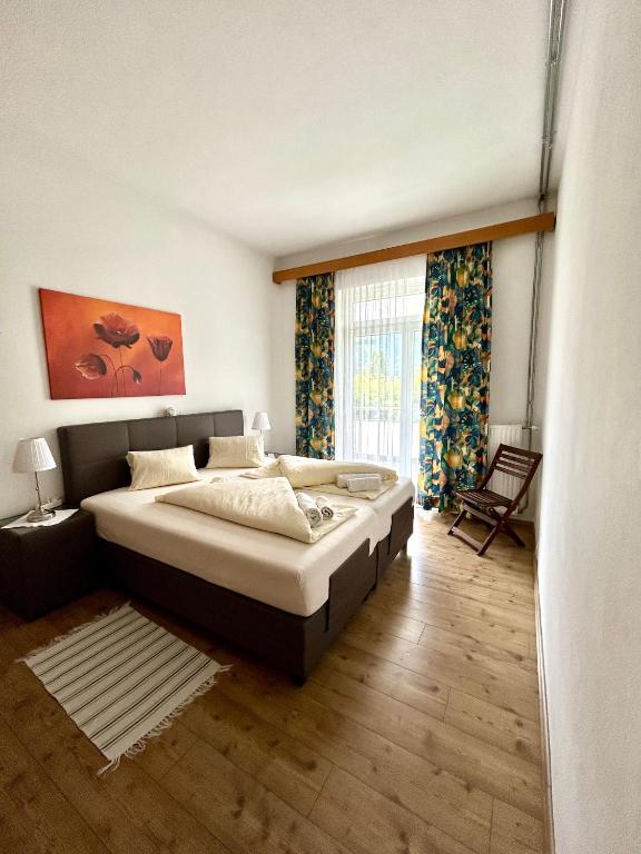 Ein Bett oder Betten in einem Zimmer der Unterkunft Strandhotel Prinz