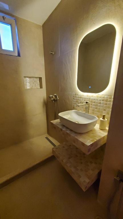 Koupelna v ubytování MAKA Hotel