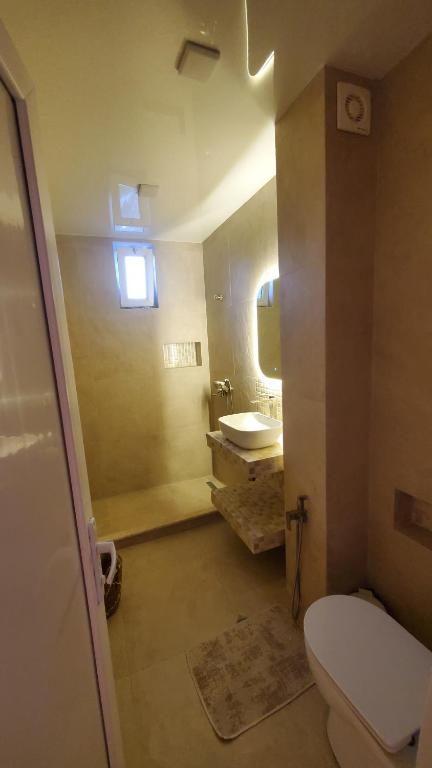 Koupelna v ubytování MAKA Hotel