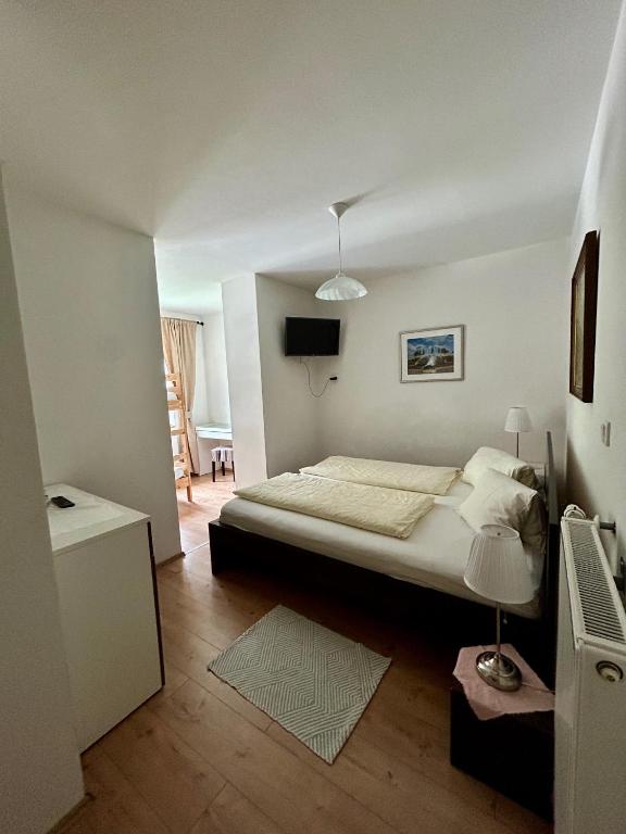 Ein Bett oder Betten in einem Zimmer der Unterkunft Strandhotel Prinz