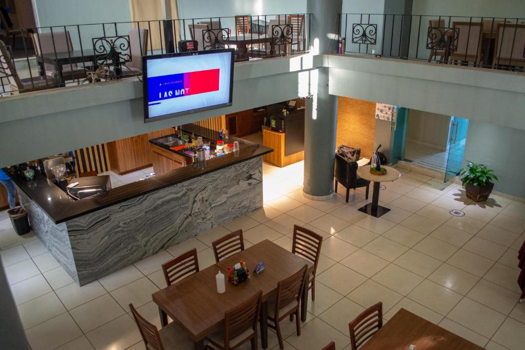 TV a/nebo společenská místnost v ubytování Hotel Real de La Barca