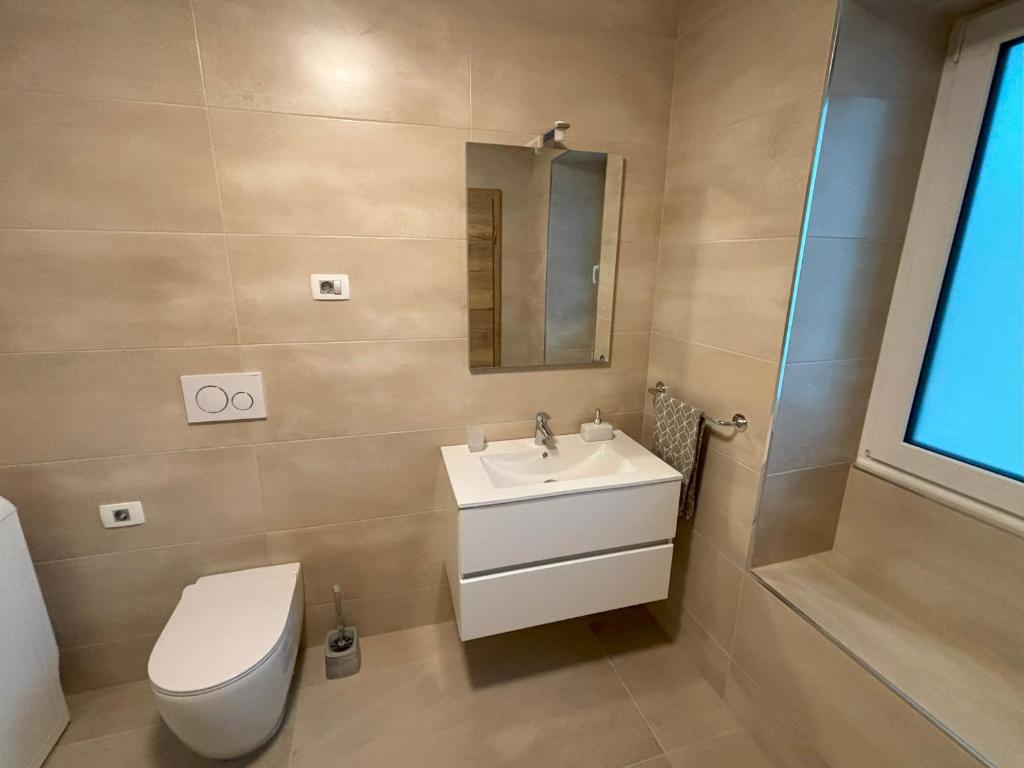 Koupelna v ubytování Livan Apartment