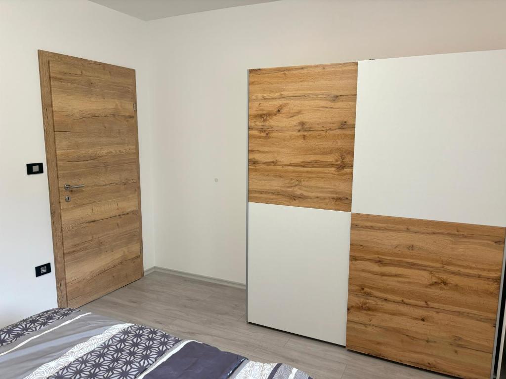Postel nebo postele na pokoji v ubytování Livan Apartment