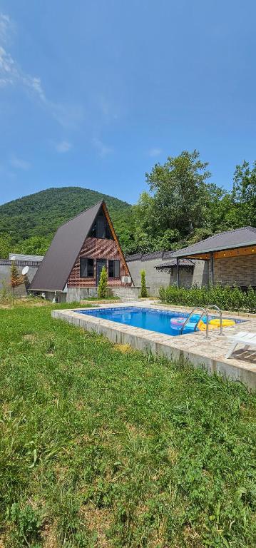 Bazén v ubytování Aframe Heating pool FrD nebo v jeho okolí
