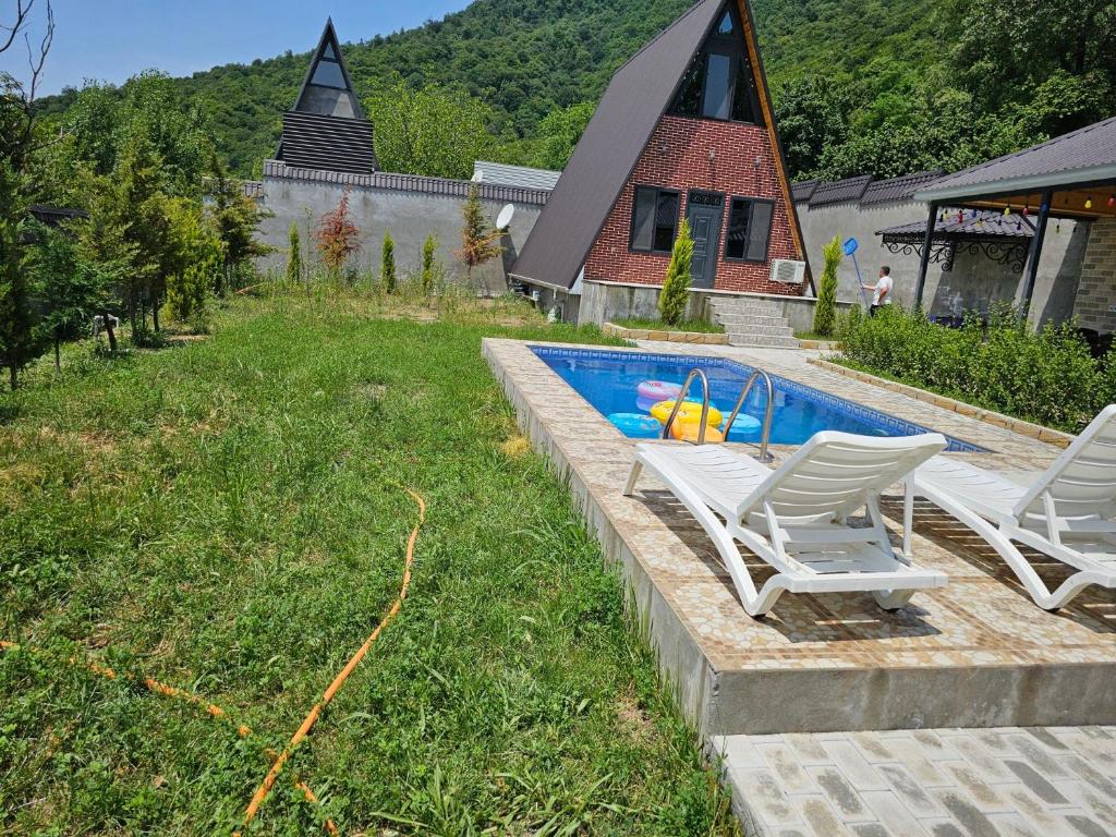 Bazén v ubytování Aframe Heating pool FrD nebo v jeho okolí