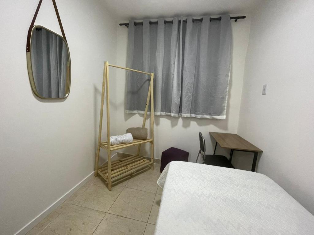 Postel nebo postele na pokoji v ubytování Casa do Naldo