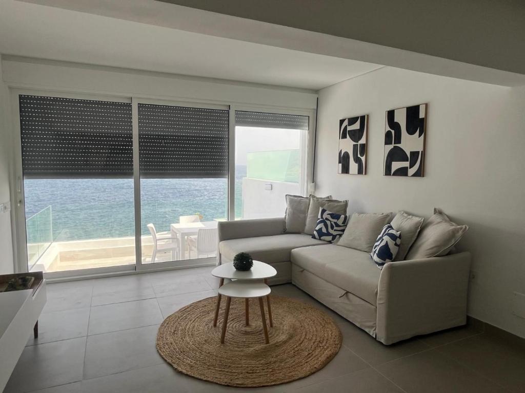 Posedenie v ubytovaní Apartamento Callao Salvaje en el mar con wifi