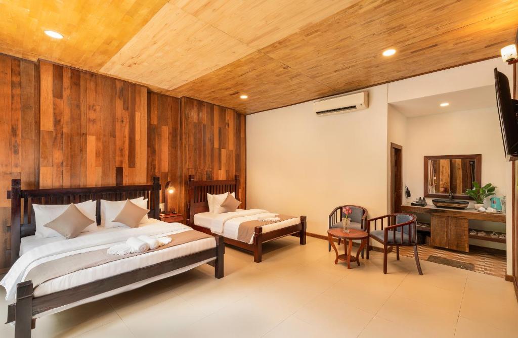 Postel nebo postele na pokoji v ubytování Tiny Home