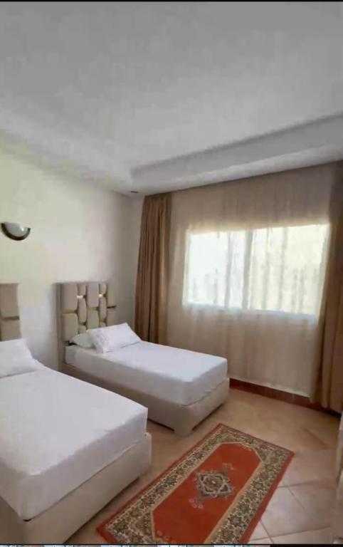 Postel nebo postele na pokoji v ubytování Motel Bab M'diq