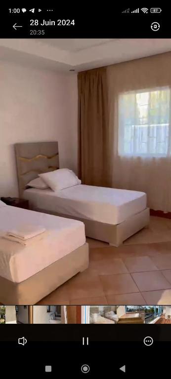 Postel nebo postele na pokoji v ubytování Motel Bab M'diq