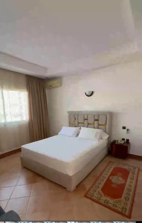 Postel nebo postele na pokoji v ubytování Motel Bab M'diq