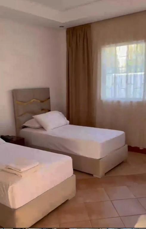 Postel nebo postele na pokoji v ubytování Motel Bab M'diq