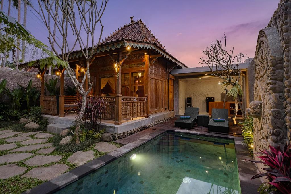 Bazén v ubytování Uddhara Ubud Villa nebo v jeho okolí