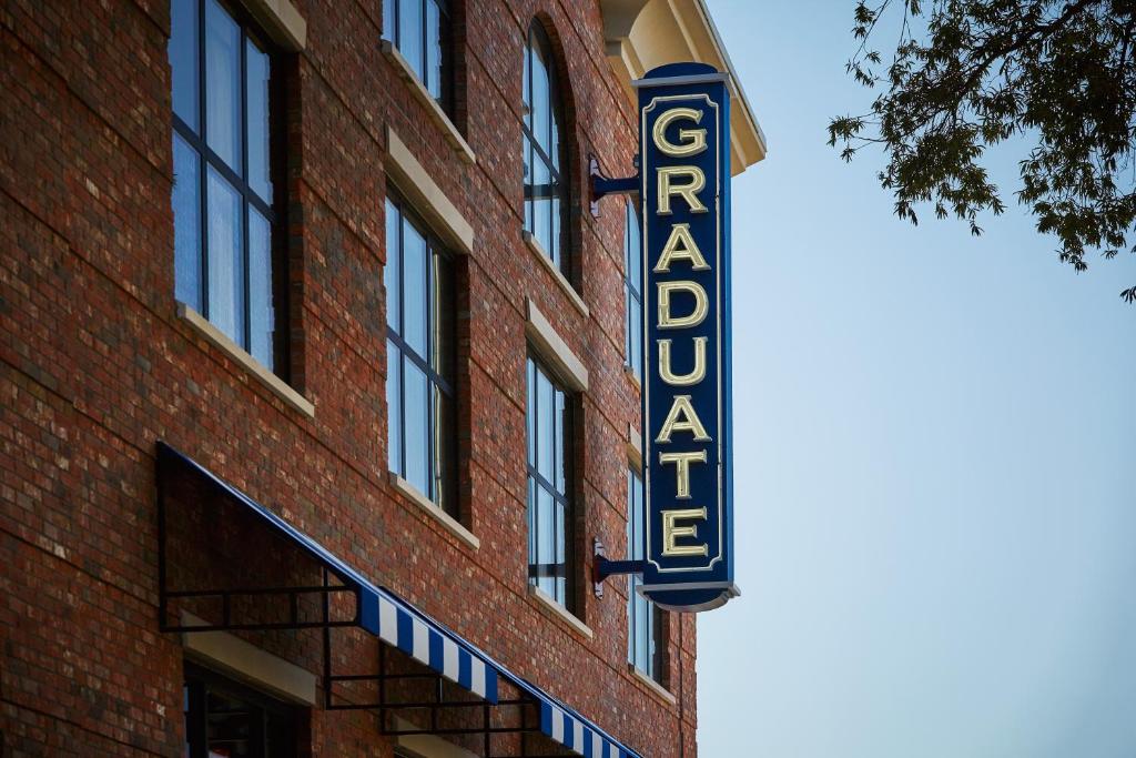 a sign on the side of a brick building at Graduate by Hilton Oxford in Oxford